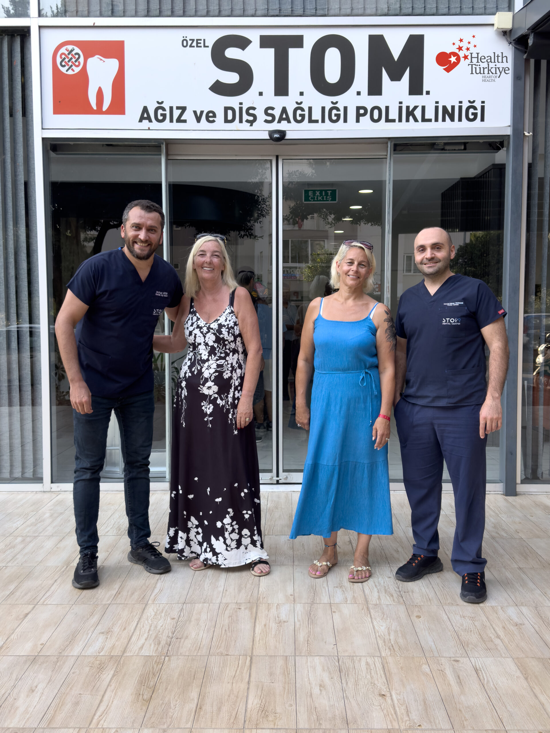Stom Dental Centre Antalya clinic entrance with team and patients