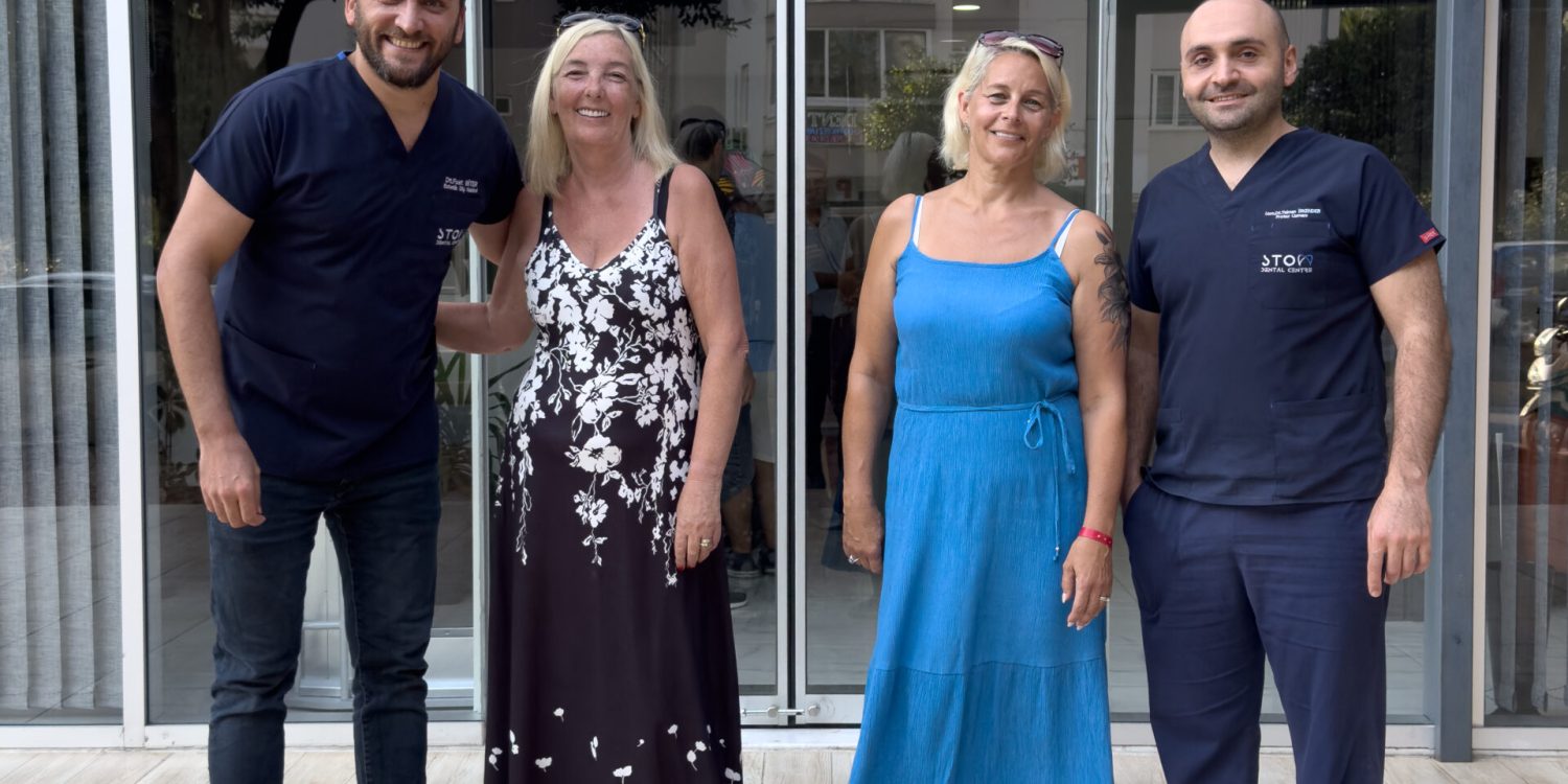 Stom Dental Centre Antalya clinic entrance with team and patients