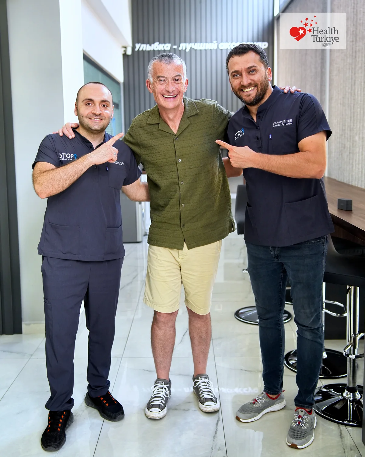 Happy patient with the Stom Dental Centre team, Antalya